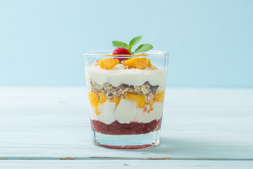 homemade mango and raspberry with yogurt and granola
