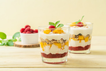 homemade mango and raspberry with yogurt and granola