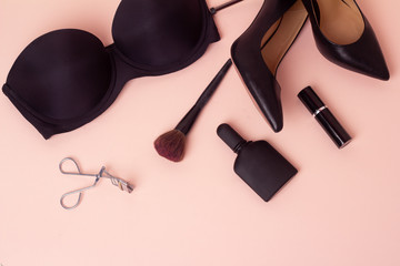 black lingerie, shoes and perfume.