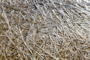 Fiberglass macro glued together to make a durable and strong material.