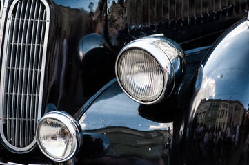 The front of an old retro car