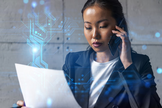 Businesswoman talking phone and binary technology hologram. Double exposure. Security network concept.