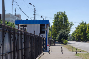 Entrance to the guarded parking lot.