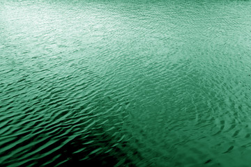 Green colored River water wave pattern. Saint Patrick's day