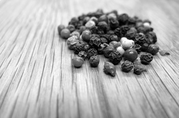 Mix of pappers on wooden board with blur effect in black and white.