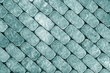 Stone walkway and cobbled road. cyan toned