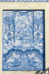 old Portuguese traditional ceramic tiles Azulejos on a wall in Aveiro, Portugal.