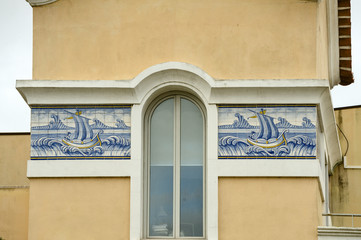 Obraz premium old Portuguese traditional ceramic tiles Azulejos on a tower in Aveiro, Portugal.