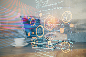 Multi exposure of technology hologram with man working on computer background. Concept of big data.