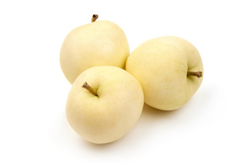 Golden delicious apples, isolated on white background