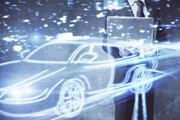 Naklejka premium Automobile theme drawing with businessman working on computer on background. Autopilot taxi concept. Double exposure.