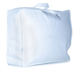White warm duvet cover in bag on white background isolation