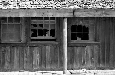 Isolated black and white photograph of abandoned old west saloon dance hall motel in Texas