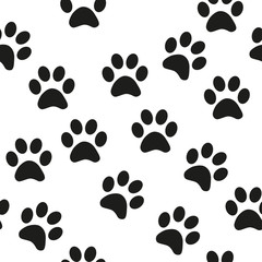 Fototapeta premium Black and white seamless pattern with paw prints. Abstract background, animal footprint, illustration.