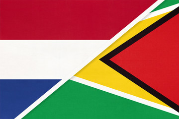 Netherlands or Holland and Guyana, symbol of national flags from textile. Championship between two countries.
