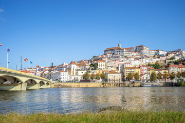Coimbra cityscape with Santa Clara Bridge over Mondego river,  Portugal