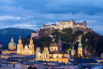 Salzburg Austria evening cityscape. Included all attractions in the city. This amazing place is Wolfgang Amadeus Mozart's hometown. Central alps mountains on the background. 