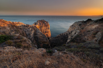 Coves and cliffs at Ponta da Piedade the most famous spot of Algarve region, in Portugal.