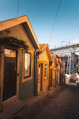 Little houses and Luis II bridge  at Porto city centre, Portugal.