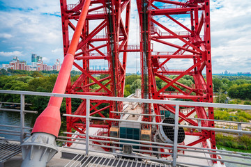 Metal structures on the bridge painted in red paint