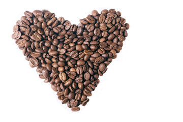Heart shape coffee beans. Love border. Romantic drink. White isolated background. Espresso grain