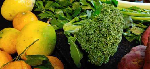 A small variety of fruits and vegetables that have just arrived from the organic fair.
