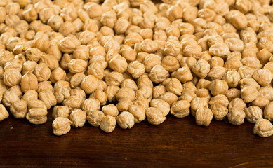 Image of raw cheakpea background on wooden surface, nutritious food