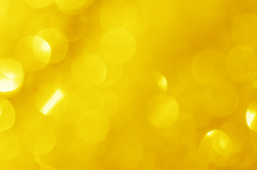 glitter light sparkle yellow golden gorgeous bokeh defocused abstract background shiny.