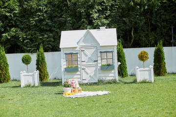 wooden white house in summer