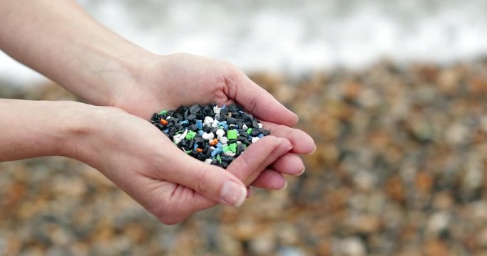 Untitled Project 6Close Up Of Hands Holding Plastic Granules Polluting Beach