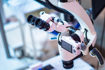 Operating microscope with built-in camera. Dental operating microscope. Dental optics. Dental...