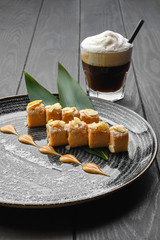 Sherbet with nuts, caramel and peanut flakes