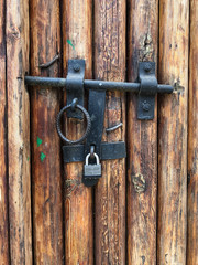 old lock on a wooden door