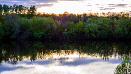 Mirror sunrise over the lake