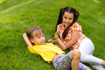 Fototapeta premium happy excited kids having fun together on playground