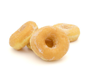 Fresh donuts with powdered sugar isolated on white background