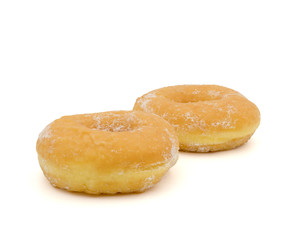 Fresh donuts with powdered sugar isolated on white background