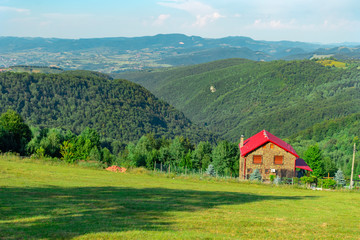 rural landscape with house in the mountains