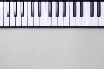 Fototapeta premium The close-up piano image is placed on the top of the image and leaves space at the bottom for text and use as a background image or a theme music audio.