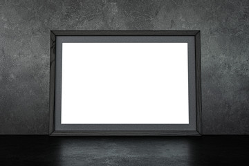 Mock up of empty picture frame black wooden in black stucco  concrete room interior