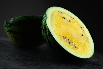 yellow watermelon cut in half