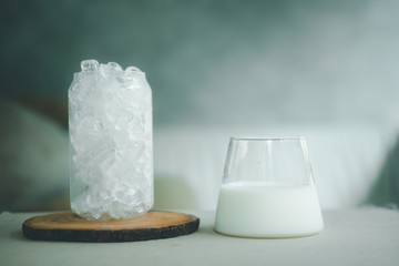 Fresh milk in glass served with ice in glass