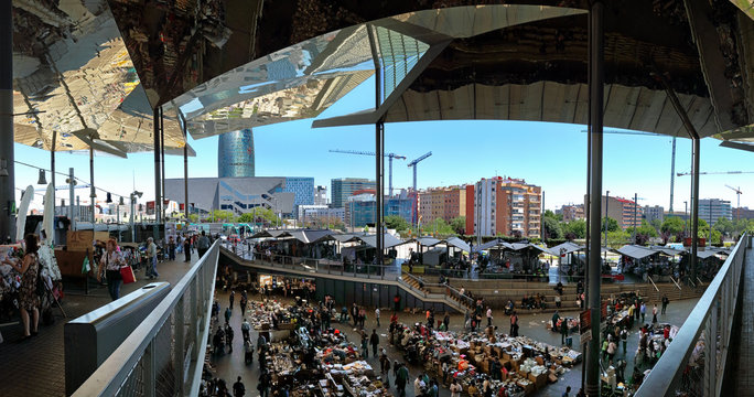 Mercat dels Encants Vells flea market with a mirrored canopy, in Barcelona, Spain