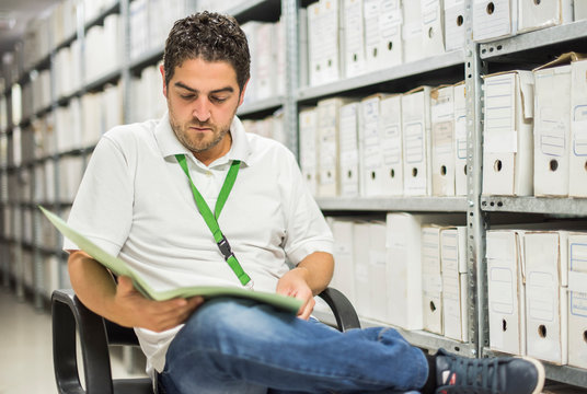 Man working on a court documentation file