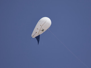 Airship with video camera in the blue sky © NCKAHDEP