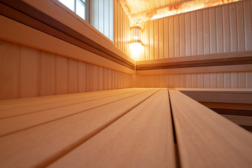 Fototapeta premium Wooden sauna with modern lighting