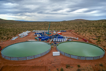 Vaca Muerta, Argentina, November 25, 2015: Extraction of unconventional oil. Water tanks for...