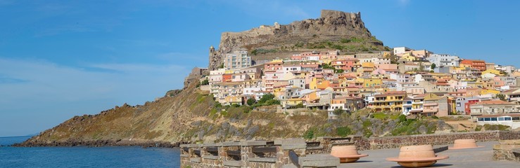 Fototapeta na wymiar Castel and colorful houses in Castelsardo town, Sardinia, Italy.