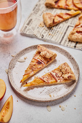 fruit pie with peaches on sand dough