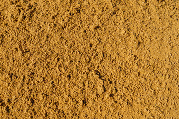 Background close-up photos of the texture details of sand and soil for construction background. Grunge and dirty style